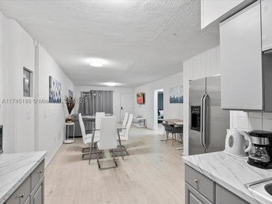 Income-producing 4-unit STR multifamily with prime redevelopment - photo 10