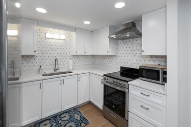 Impressively priced for the quality offered, this condominium is - photo 11