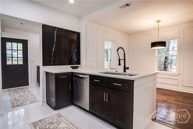 Don't miss this fully renovated 3-bedroom, 2-bath home in the - photo 7