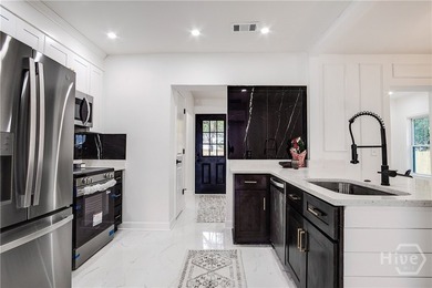 Don't miss this fully renovated 3-bedroom, 2-bath home in the - photo 9