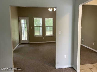 This property features 3 bedrooms and 2 bathrooms. Covered back - photo 3