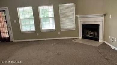 This property features 3 bedrooms and 2 bathrooms. Covered back - photo 4