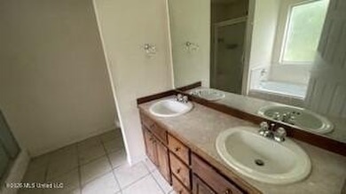 This property features 3 bedrooms and 2 bathrooms. Covered back - photo 5