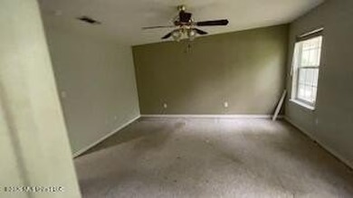 This property features 3 bedrooms and 2 bathrooms. Covered back - photo 6