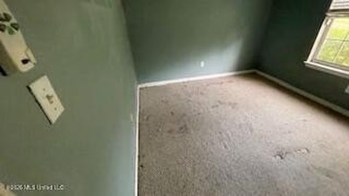 This property features 3 bedrooms and 2 bathrooms. Covered back - photo 7