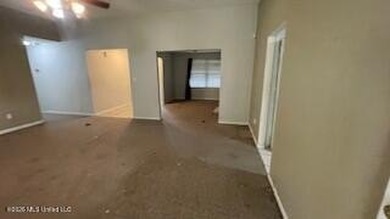 This property features 3 bedrooms and 2 bathrooms. Covered back - photo 8