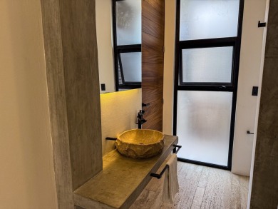 This exquisite 4-bedroom, 4.5-bathroom villa offers a serene - photo 12