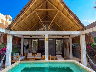 This exquisite 4-bedroom, 4.5-bathroom villa offers a serene - photo 14