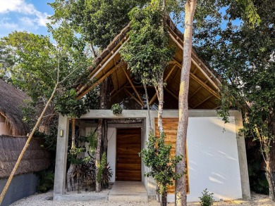 This exquisite 4-bedroom, 4.5-bathroom villa offers a serene - photo 17