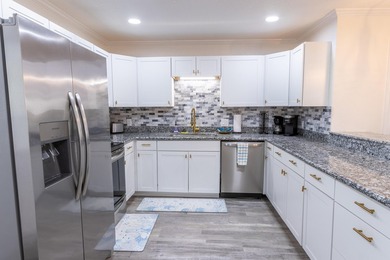 This is the lowest price townhome you'll find in Woodland Shores - photo 11