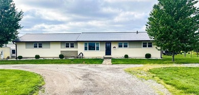 Welcome to 9439 KY 57 in Tollesboro, KY - a charming 3-bedroom - photo 3