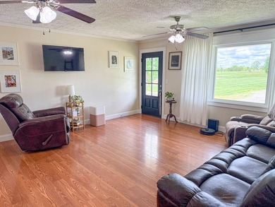 Welcome to 9439 KY 57 in Tollesboro, KY - a charming 3-bedroom - photo 5