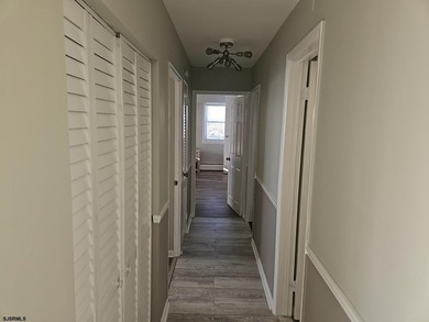 Experience elevated coastal living in this beautifully redone - photo 16