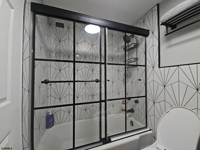 Experience elevated coastal living in this beautifully redone - photo 17