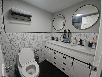 Experience elevated coastal living in this beautifully redone - photo 20