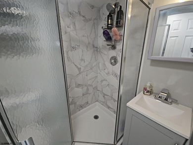 Experience elevated coastal living in this beautifully redone - photo 22