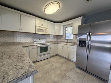 Check out this charming 2 bed, 2 bath home with many unique - photo 3