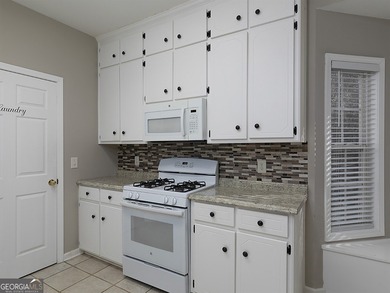 Charming two bedroom, two bath, RANCH on almost 1 acre in Canton