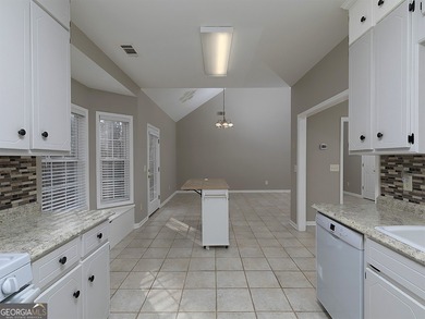 Charming two bedroom, two bath, RANCH on almost 1 acre in Canton