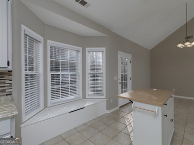 Charming two bedroom, two bath, RANCH on almost 1 acre in Canton