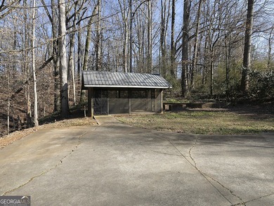 Charming two bedroom, two bath, RANCH on almost 1 acre in Canton