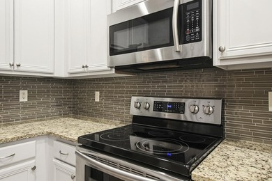 lovely upgraded kitchen & baths with great sqft. This community - photo 34