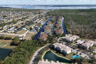 SPACIOUS TOP FLOOR CONDO WITH WATER VIEW, GREAT AMENITIES AND - photo 2
