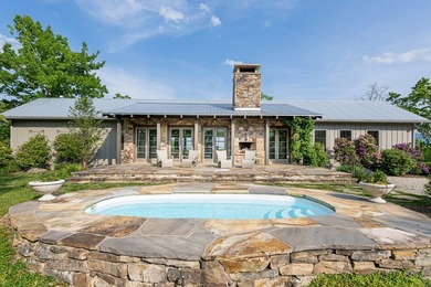 Perched above the pristine waters of Lake Fontana, this - photo 2