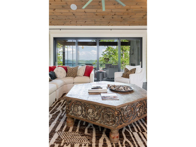 Perched above the pristine waters of Lake Fontana, this - photo 8