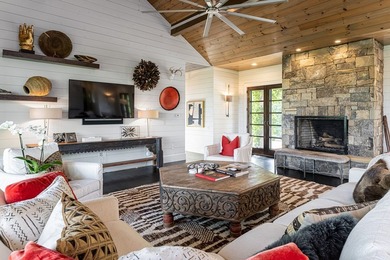 Perched above the pristine waters of Lake Fontana, this - photo 10