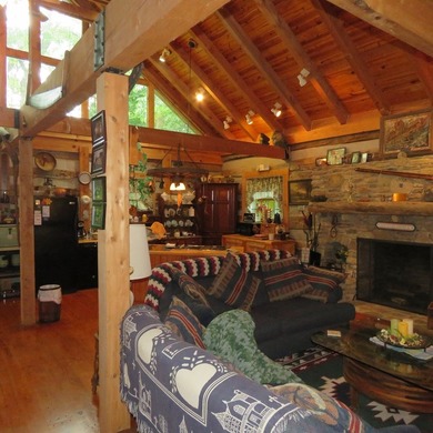 This beautiful 2-story log home sits on 6 +/- acres and offers - photo 4