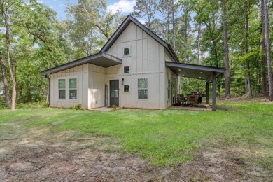 Lake Home For Sale in Lone Star, Texas