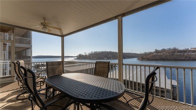 Huge screened deck, 12x32 boat slip with 8,000 lb lift, and rare - photo 25