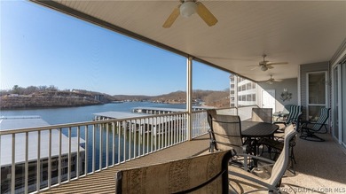Huge screened deck, 12x32 boat slip with 8,000 lb lift, and rare - photo 27