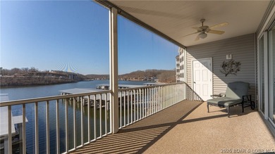 Huge screened deck, 12x32 boat slip with 8,000 lb lift, and rare - photo 28
