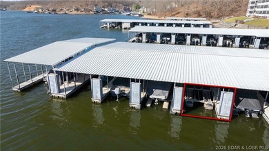 Huge screened deck, 12x32 boat slip with 8,000 lb lift, and rare - photo 33