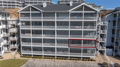 Huge screened deck, 12x32 boat slip with 8,000 lb lift, and rare - photo 35