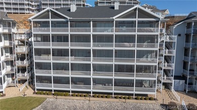 Huge screened deck, 12x32 boat slip with 8,000 lb lift, and rare - photo 36