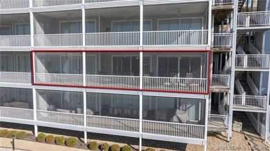 Huge screened deck, 12x32 boat slip with 8,000 lb lift, and rare - photo 37