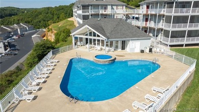 Huge screened deck, 12x32 boat slip with 8,000 lb lift, and rare - photo 47