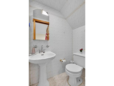 Rare opportunity to own a legal two-family brick home in the - photo 11