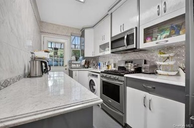 Rare opportunity to own a legal two-family brick home in the - photo 13