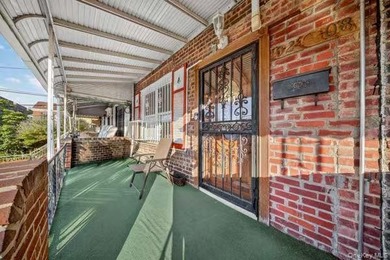 Rare opportunity to own a legal two-family brick home in the - photo 16