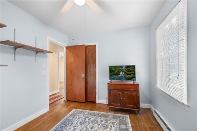 Welcome to 108 Belmont Circle - a charming 3 or 4 bedroom, 1