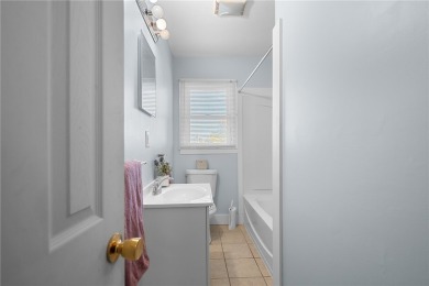 Welcome to 108 Belmont Circle - a charming 3 or 4 bedroom, 1