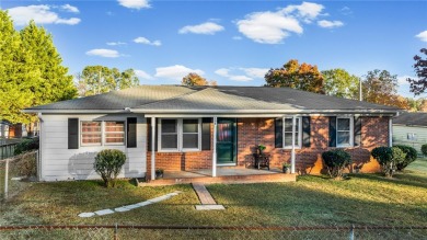 Welcome to 108 Belmont Circle - a charming 3 or 4 bedroom, 1