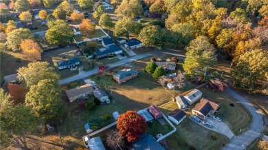 Welcome to 108 Belmont Circle - a charming 3 or 4 bedroom, 1