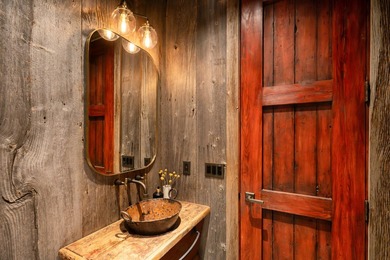 Set on 2.5 acres directly on the Bigwood River within a private - photo 12