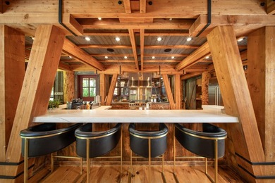 Set on 2.5 acres directly on the Bigwood River within a private - photo 13