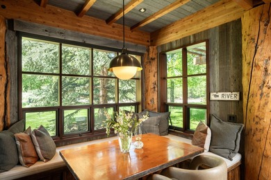 Set on 2.5 acres directly on the Bigwood River within a private - photo 15